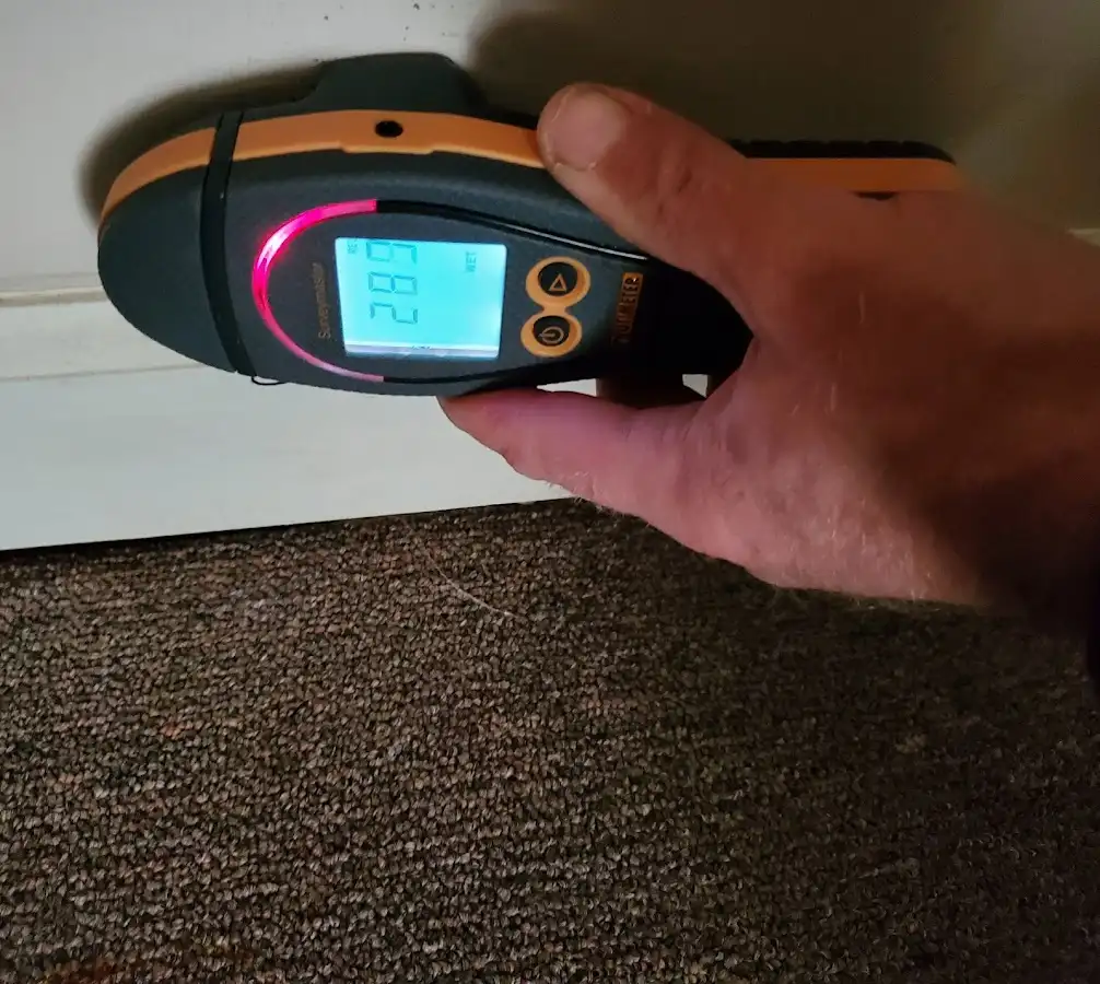 Moisture detection at baseboard during Storm Damage Restoration in Gastonia